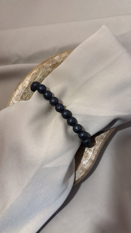 BRACCIALE ELASTICO NERO IN PIETRE VULCANICHE