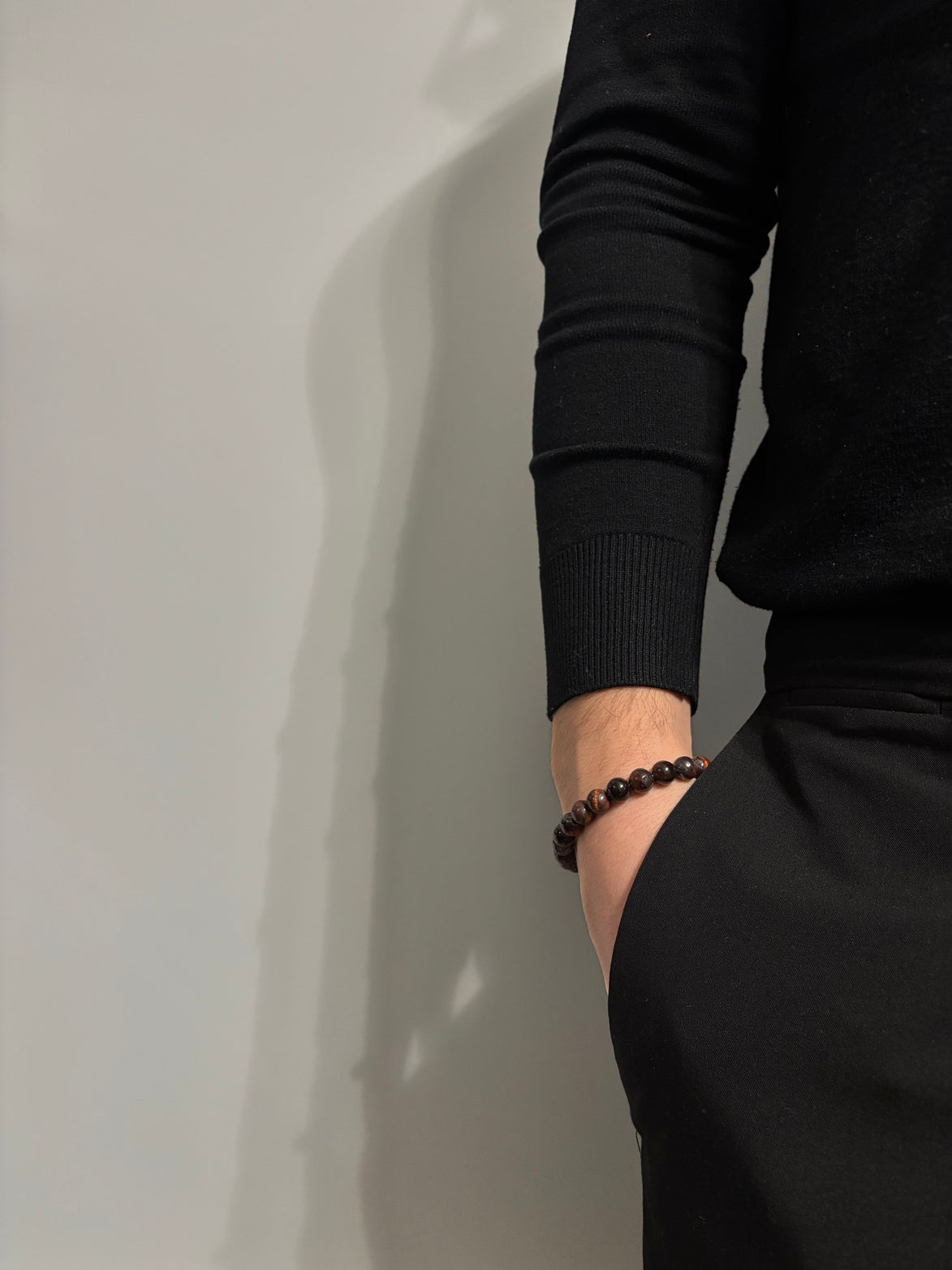 BRACCIALE MARRONE CON PIETRE IN VETRO