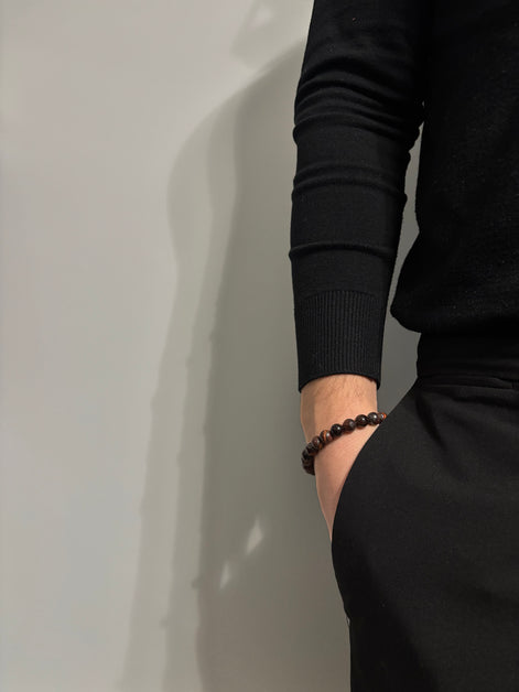 BRACCIALE MARRONE CON PIETRE IN VETRO